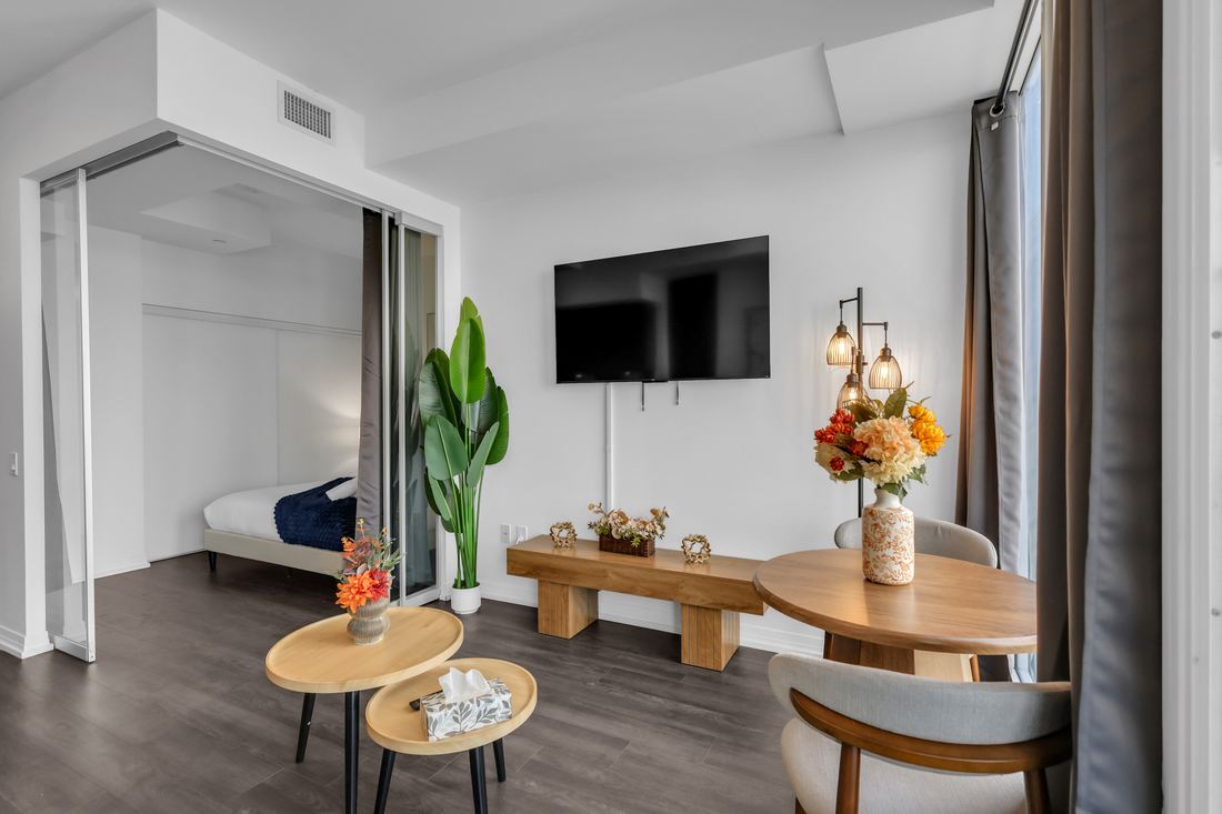 Studio kitchen with stainless appliances, kettle and coffee maker